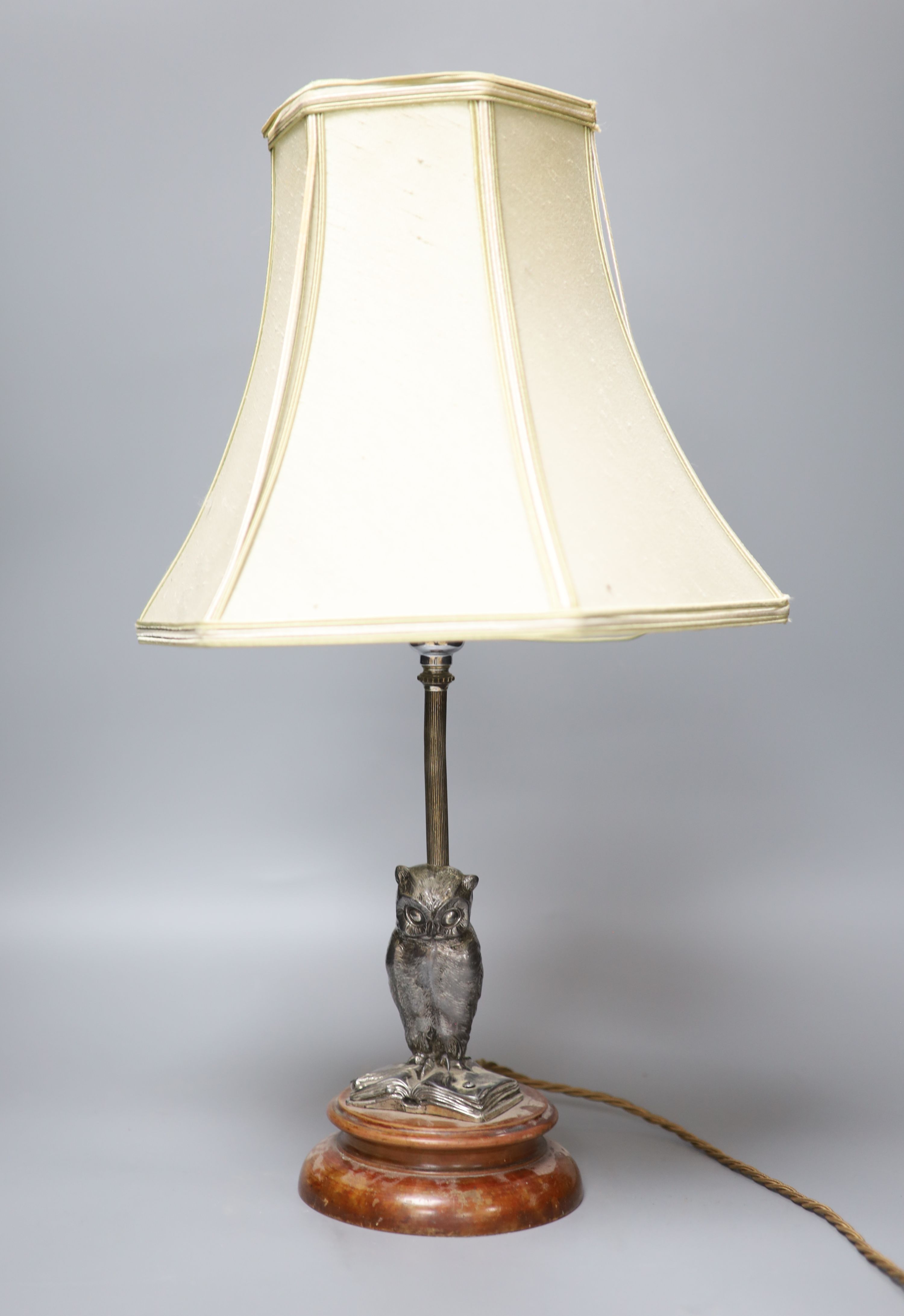 An early 20th century silver plated owl table lamp and shade, overall height 50cm